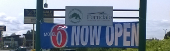 motel 6 now open banner