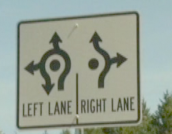 roundabout entrance sign