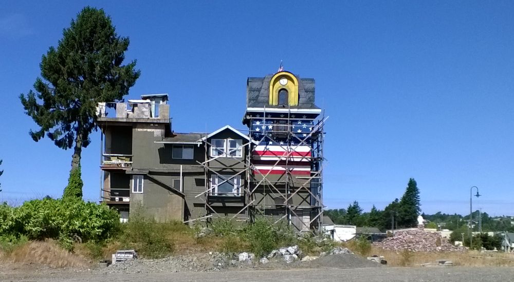 clock tower building showing new exterior treatment on exposed plywood 2015-06-18