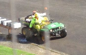 COF staff spraying curbs and sidewalks