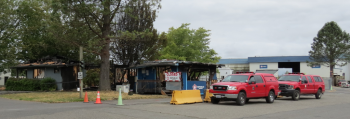republic services office and scale house after fire with fire marshal vehicles out front 2016-06-30 0945