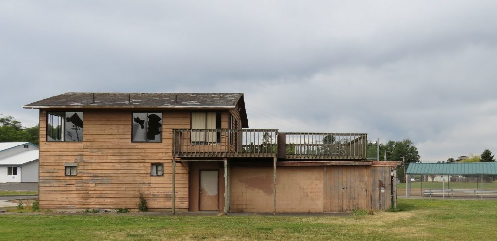 pioneer park field house with broken windows