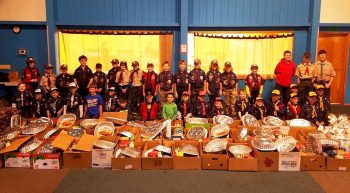 pack-4026-poses-with-41-thanksgiving-baskets-they-assembled-photo-courtesy-pack-4026