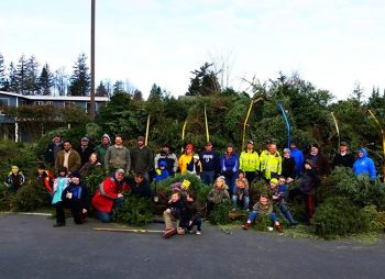 Ferndale Cub Scouts pose with over 400 Christmas trees collected during the 2017 tree pickup (January 7, 2017). Photo courtesy Cub Scout Pack 4026