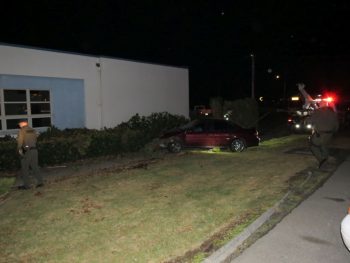 car crash on windward hs campus - car pulled from behind bushes
