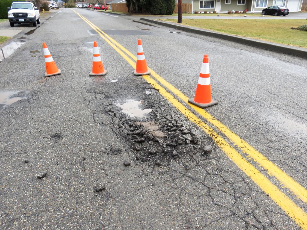 road surface damage on Ferndale Terrace between Seamount Drive and Birch Drive