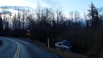 vehicle off the road during morning icy conditions Hovander Road near W Smith Rd 2017-01-09