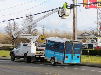 Astound Broadband (aka WaveDivision Holdings) employee working on their fiber network on LaBounty Drive 2017-02-16
