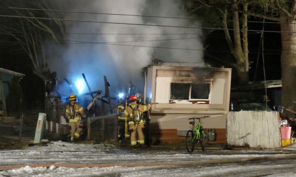fire crews begin dousing hot spots after fire destroyed a mobile home on trigg rd 2017-02-10