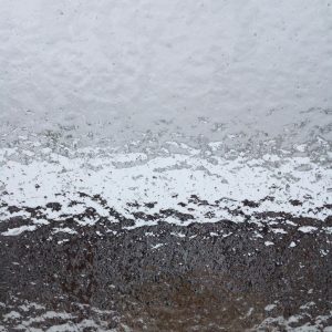 glaze from freezing rain seen through exterior window. photo paul ingram