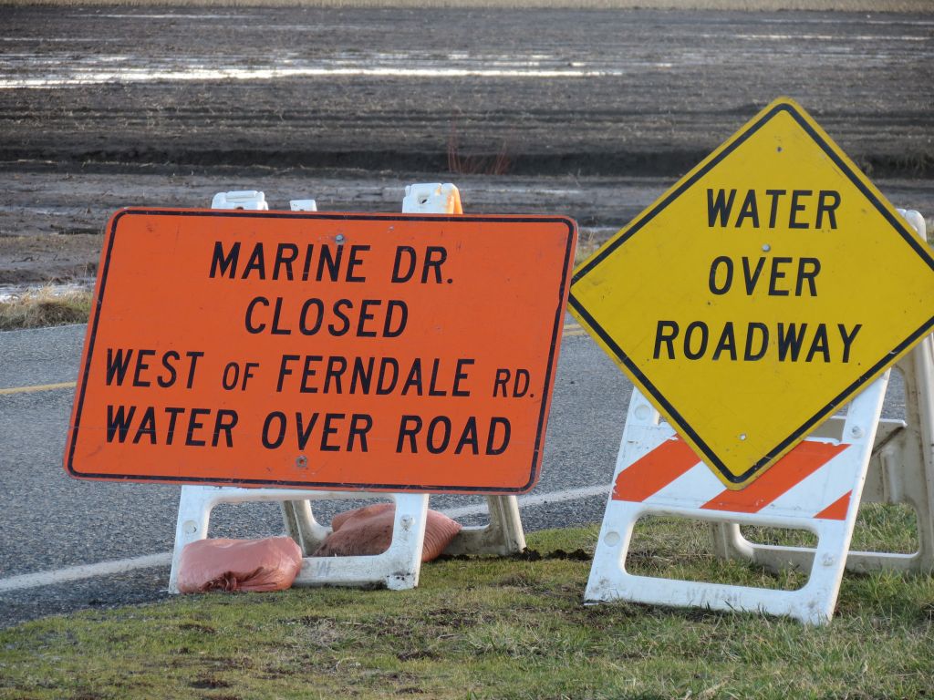 marine dr closed w of ferndale road water over roadway signs