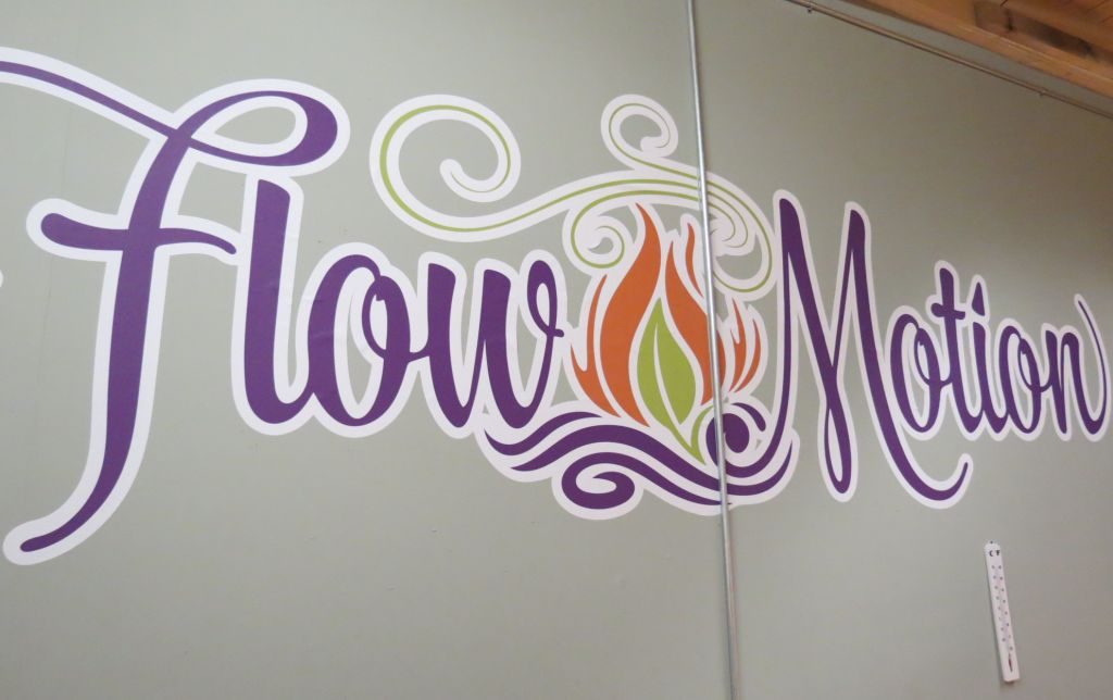 flow motion logo on the wall of the infrared hot yoga room 2017-03-28