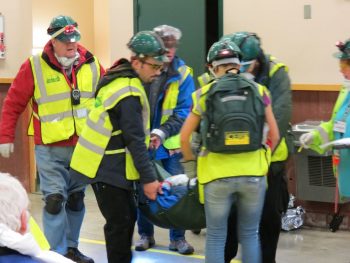 CERT 89 final exercise - team carries a victim to the triage area