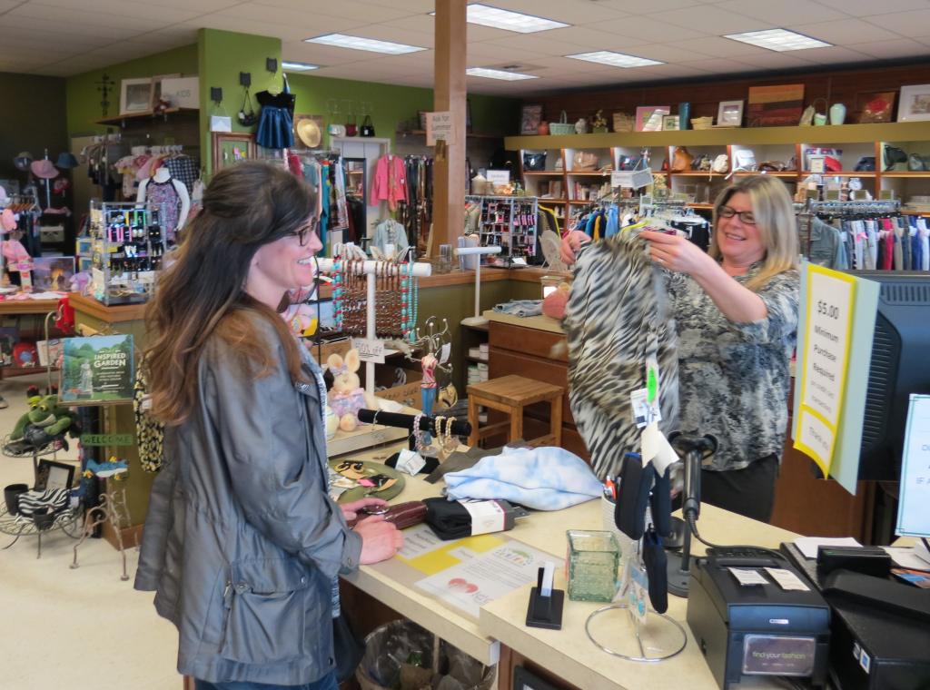 find your fashion owner barb scoggins helps a customer who came from outside the area 2014-04-17