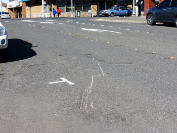 runaway boat trailer left marks on the road at the point where it struck two parked cars 2017-05-07
