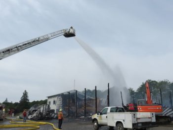 Crews work to clean up after knocking down the large structure fire at Friberg Construction (June 17, 2017). Photo Discover Ferndale