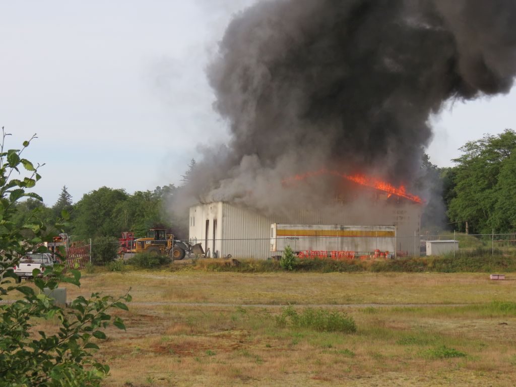 The Friberg Construction warehouse and office building was completely involved when firefighters arrived (June 17, 2017). Photo: My Ferndale News