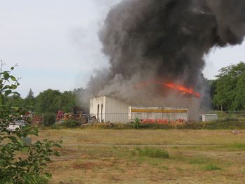 The Friberg Construction warehouse and office building was completely involved when firefighters arrived (June 17, 2017). Photo: My Ferndale News