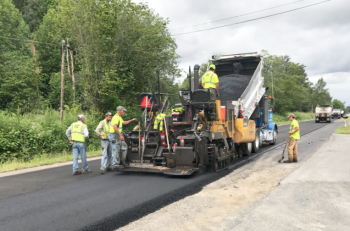 the top lift of asphalt is placed atop the fabric on portal way cof Photo 6-13-17