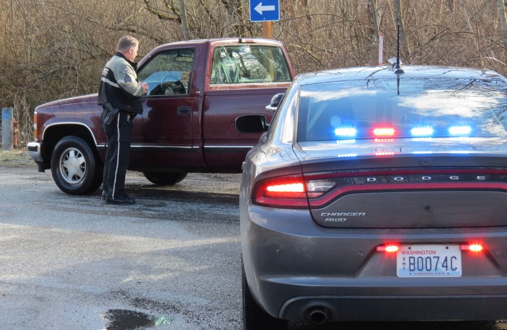 WCSO deputy makes contact with a driver. Photo: Whatcom News