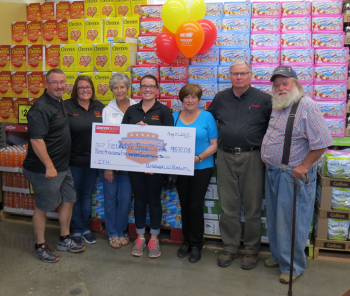 cermony check to food bank