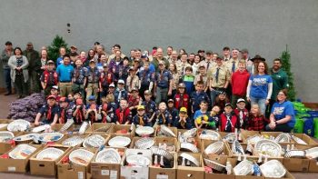 Ferndale Cub Scout Pack 4026 poses with 41 Thanksgiving baskets they assembled (November 2017). Photo courtesy of Cub Scout Pack 4026