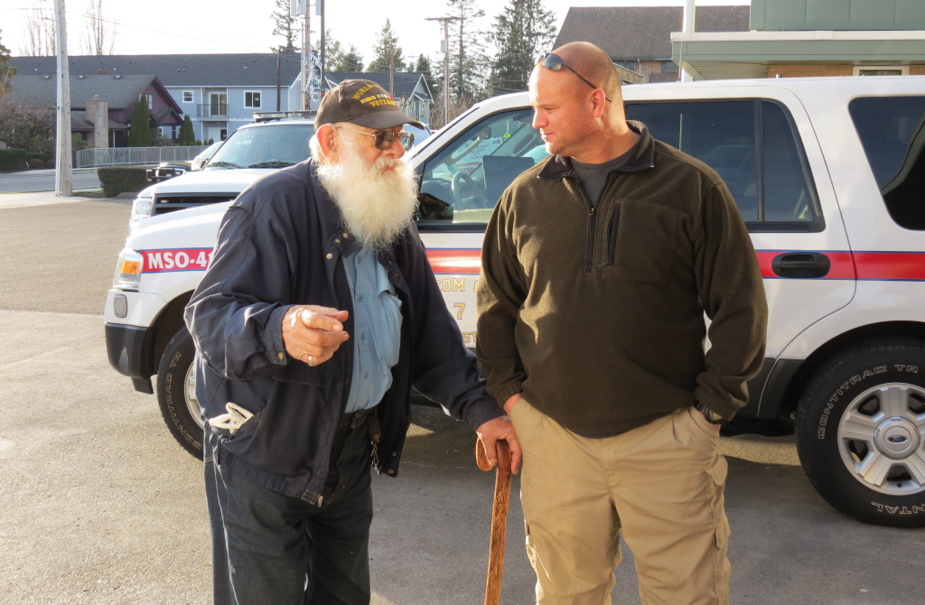 Retiring WCFD7 Commissioner Gerald Metzger talks with incoming Commissioner Eric Grant before Metzger's last meeting (December 14, 2017). Photo: My Ferndale News