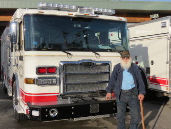 commissioner gerald metzger poses in front of a new pumper truck delivered to wcfd7 2017-12-14