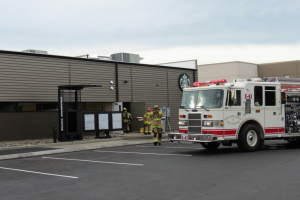 Firefighters access the Starbucks side of the Samuels Retail Center building after an appliance fire 2018-01-15