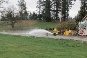 WCFD7 firefighters control a portable propane tank fire on W Axton Road east of Northwest Drive 1 2018-02-07
