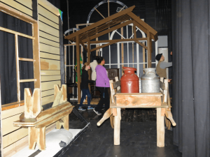 stage crews and actors hustle around just before dress rehearsal for fiddler on the roof 2018-02-21