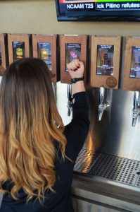 self service tap tapping rfid band to screen w-700x