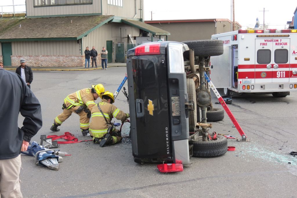 wcfd7 crews stabilize a truck on its side before extricating the driver at a crash in 1700 block of Main Street 2018-03-30