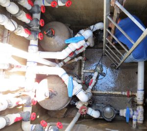 cof worker in the underground mechanical room works to upgrade the riverwalk fountain 2018-05-02