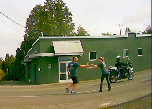 lt matt huffman hands off special olympics torch at nw drive and w smith rd cleaned