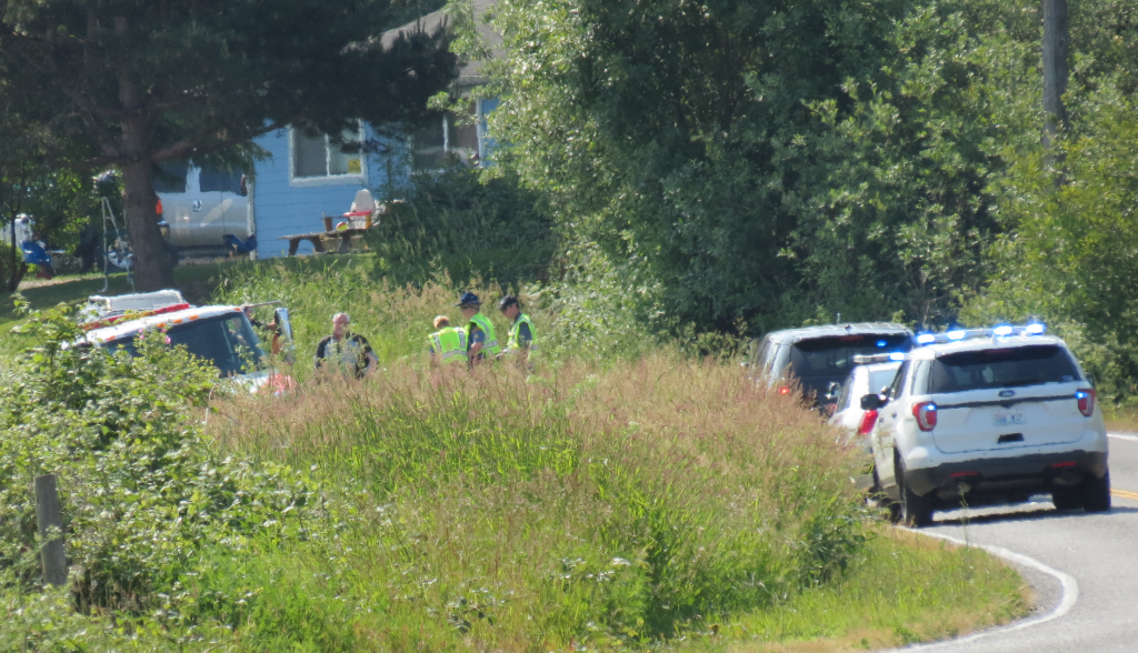 investigators work at the scene of a fatal crash on Lummi Shore Drive 2018-06-06