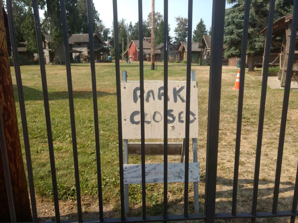Park closed sign at Pioneer Park during construction expected to close the park the remainder of the tour season.