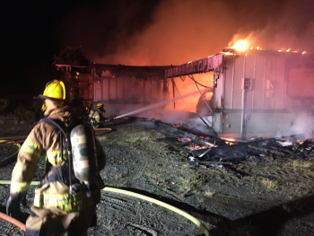 Firefighters at the scene of a house fire in the 2300 block of Brown Road (July 18,2018). Photo courtesy of Whatcom County Fire District 7