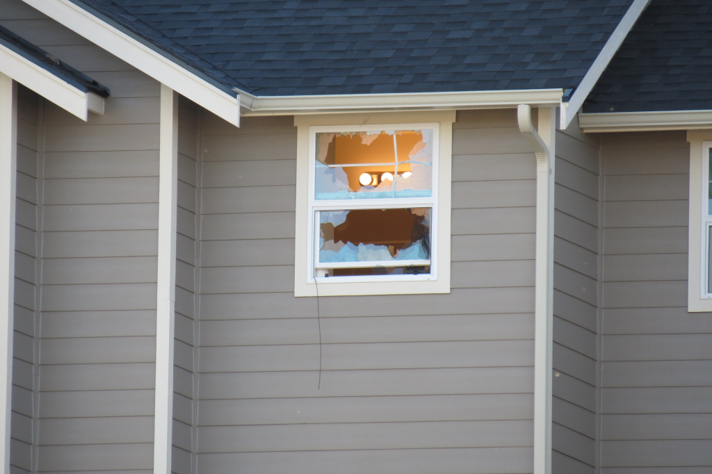 broken windows were visible after a large le presence in the calico loop neighborhood 2018-07-08