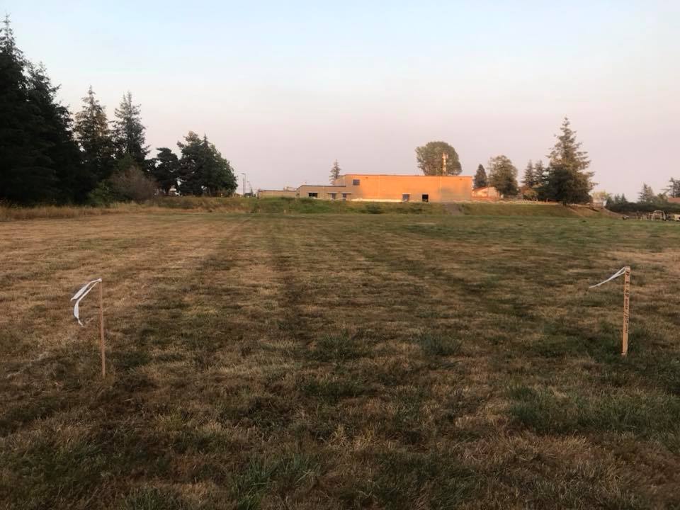 skyline elementary school track engineering stakes with building in bg 2018-08-17 photo Alyssa Pavitt Skyline PTO Vice President