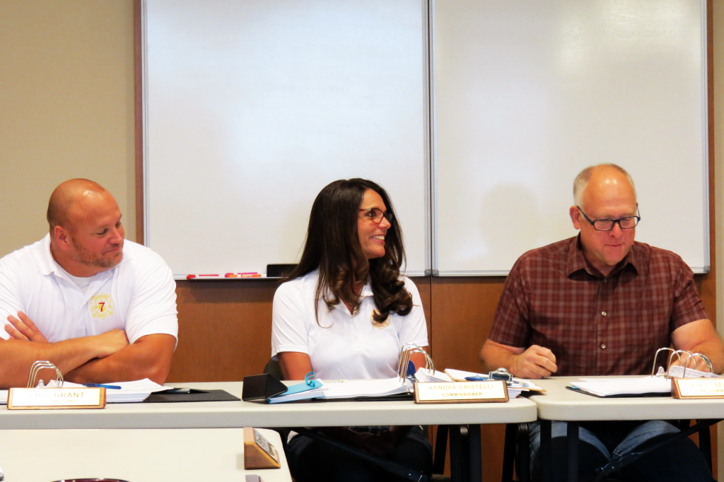 kendra cristelli takes her place with the other wcfd7 commissioners - eric grant - kendra cristelli - mike murphy.png