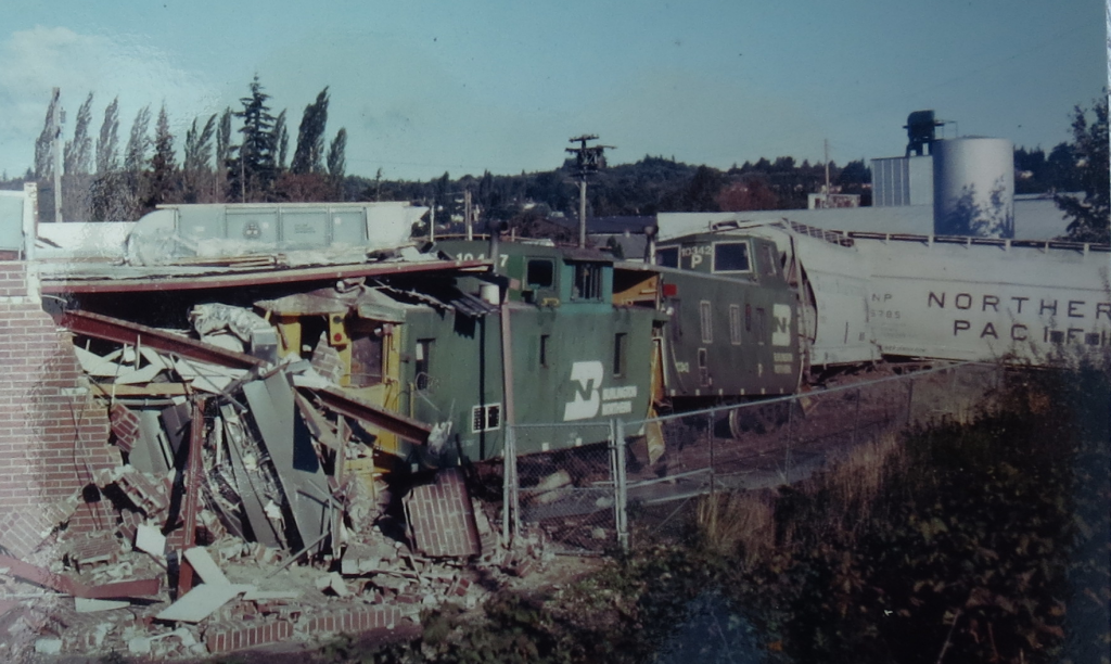 scene of train car derailment that left 1 caboose inside the Ferndale ConTel building 1979-09 photo Ron Willand