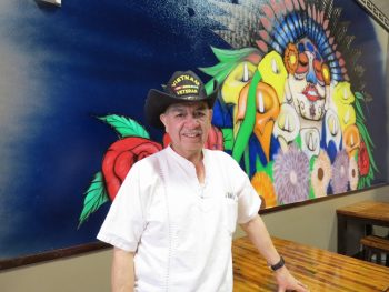 Manuel Reta, owner of Don Samuel's Mexican Grill & Tequila Bar, poses in front of a mural recently completed in time for the restaurant's grand opening (January 2, 2019). Photo: My Ferndale News