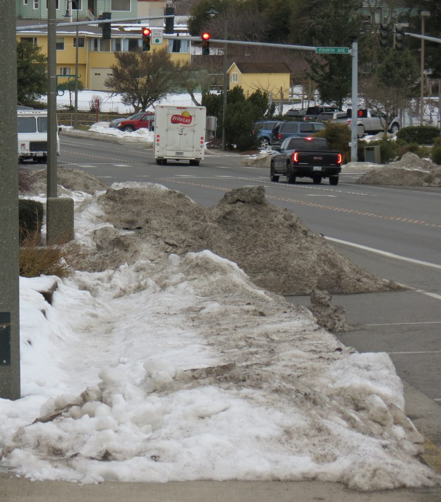 Recent snowfall and subsequent shoveling and plowing of roads and parking areas left most sidewalks challenging to walk and even occasionally blocked (February 18, 2019). Photo: My Ferndale News