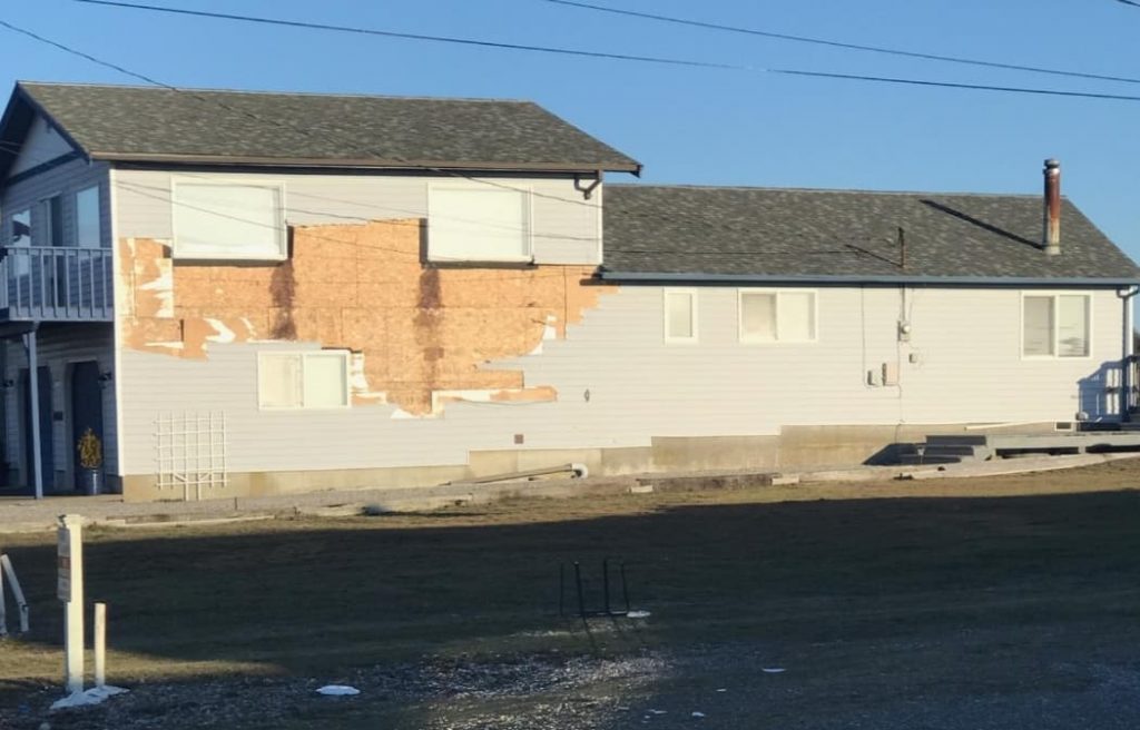 Siding damage in the 4200 block of Saltspring Drive after a windstorm with 70mph gusts (February 9, 2019). Photo courtesy Sandy Point Watch
