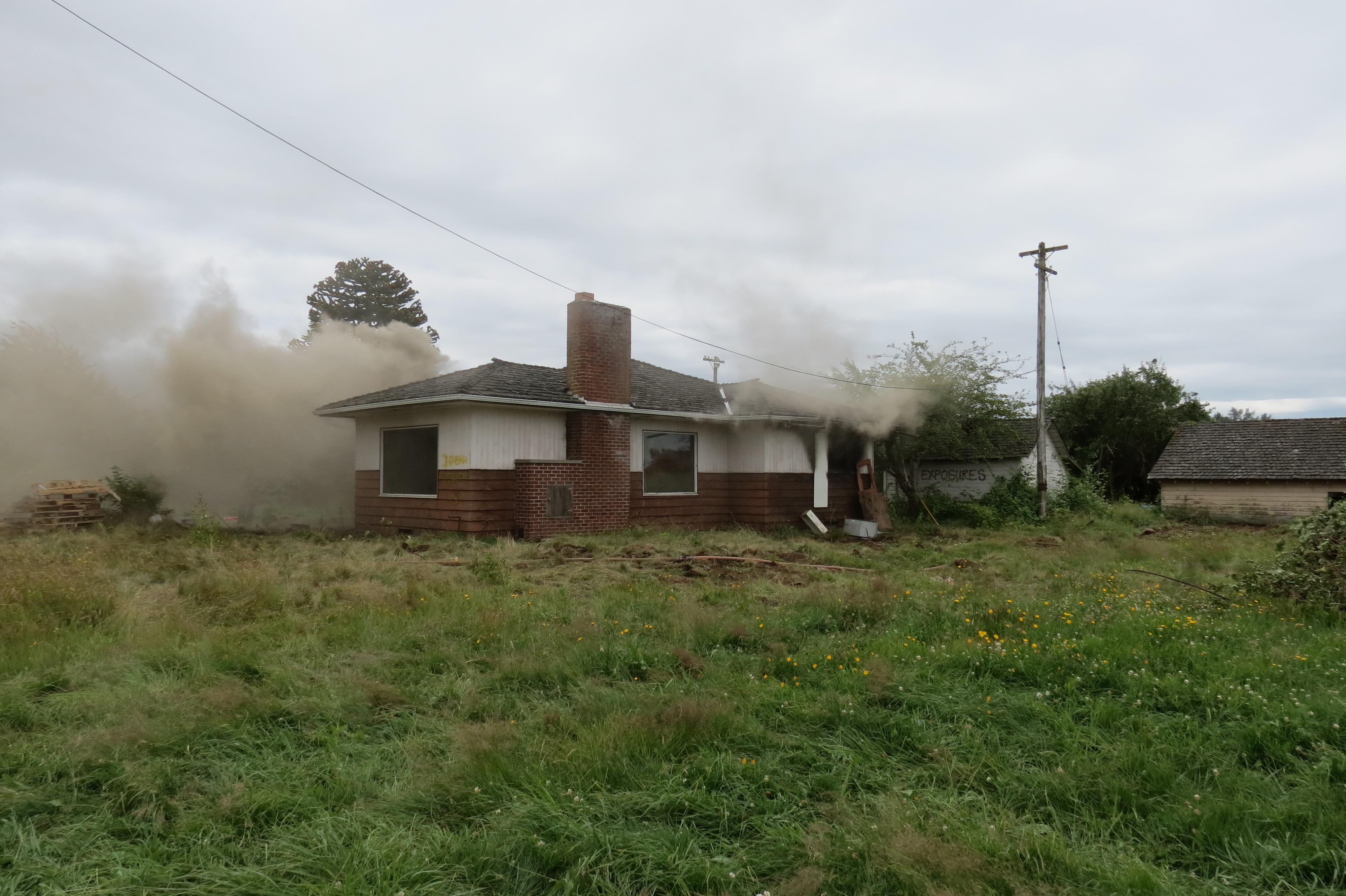 Scene of a live fire exercise at a house in the 1500 block of Main Street (June 22, 2018). Photo: Whatcom News
