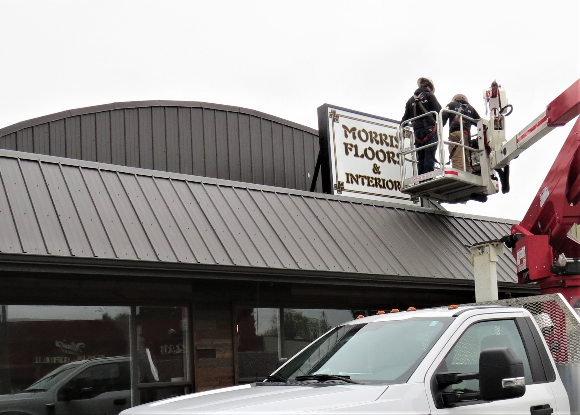 The Morris Floors & Interiors sign gets put in place at the company's new Ferndale location at 2002 Main Street (April 19, 2019). Photo: My Ferndale News