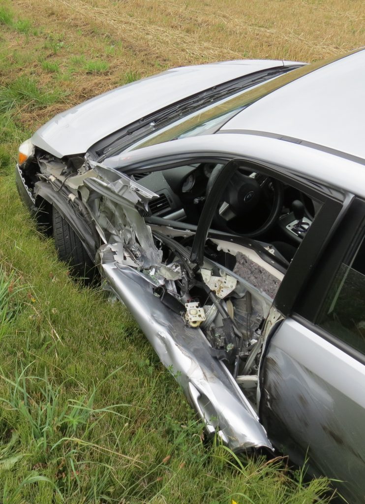 Damage visible on Subaru Impreza after collision with a farm tractor on Olson Road (July 11th, 2019). Photo: My Ferndale News