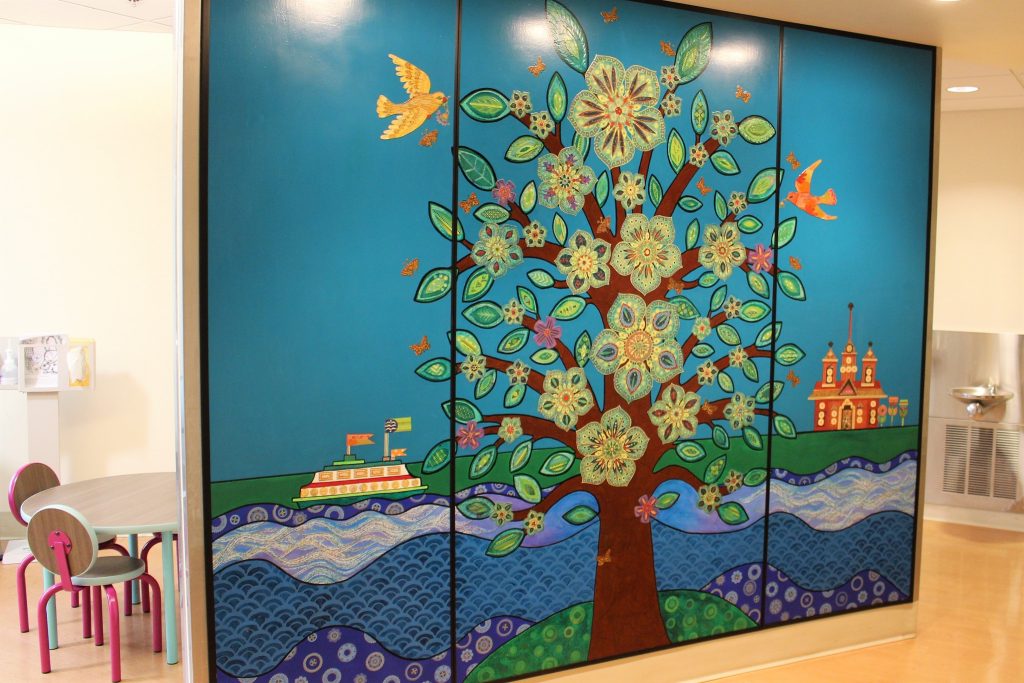 Tree of Life mural by Bellingham artist Mary Ennes Davis at PeaceHealth St Joseph Medical Center ER waiting area (2019). Photo courtesy of PeaceHealth
