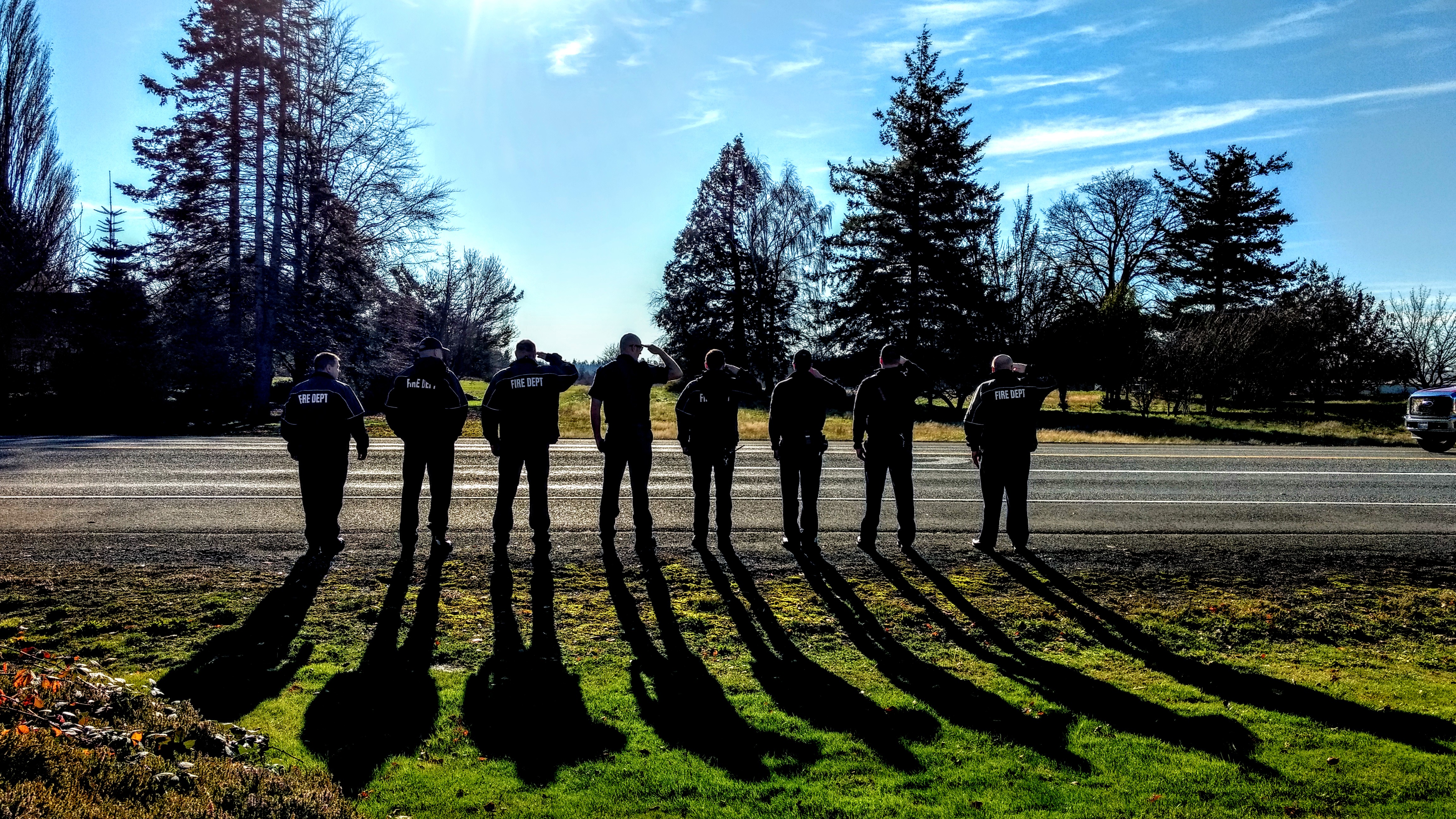 Representatives from Whatcom County Fire District 7 stand at attention while the procession passes (November 20, 2019). Photo: My Ferndale News